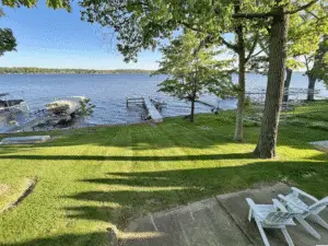 View from main floor deck. 50’ of accessible Pewaukee Lake frontage!