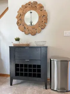 Wine cabinet bar contains wine glasses for guests. Entire house is well stocked with tableware