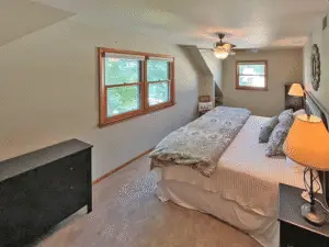 Master bedroom with nice lake views. King size bed, closet space and dressers