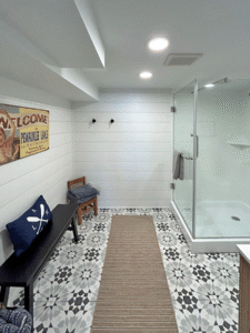 Lower level newly remodeled full bath with changing area