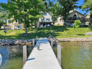 View of house from pier with ’Larry the Owl’ watching over
